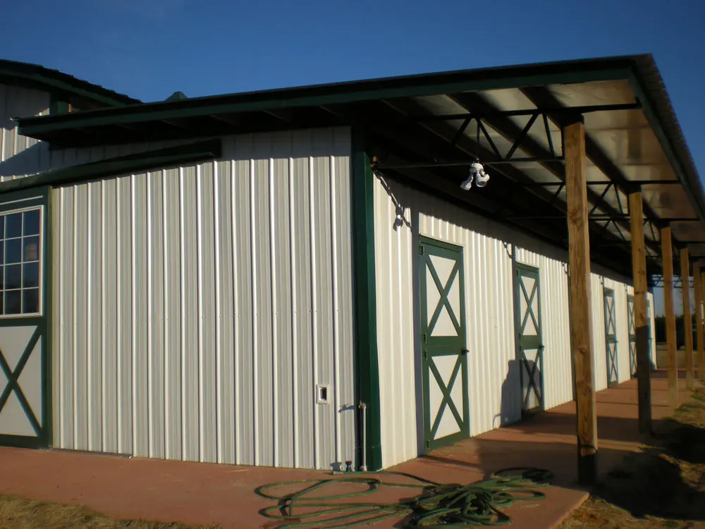 Agriculture structure with polar white metal walls and metal roofing
