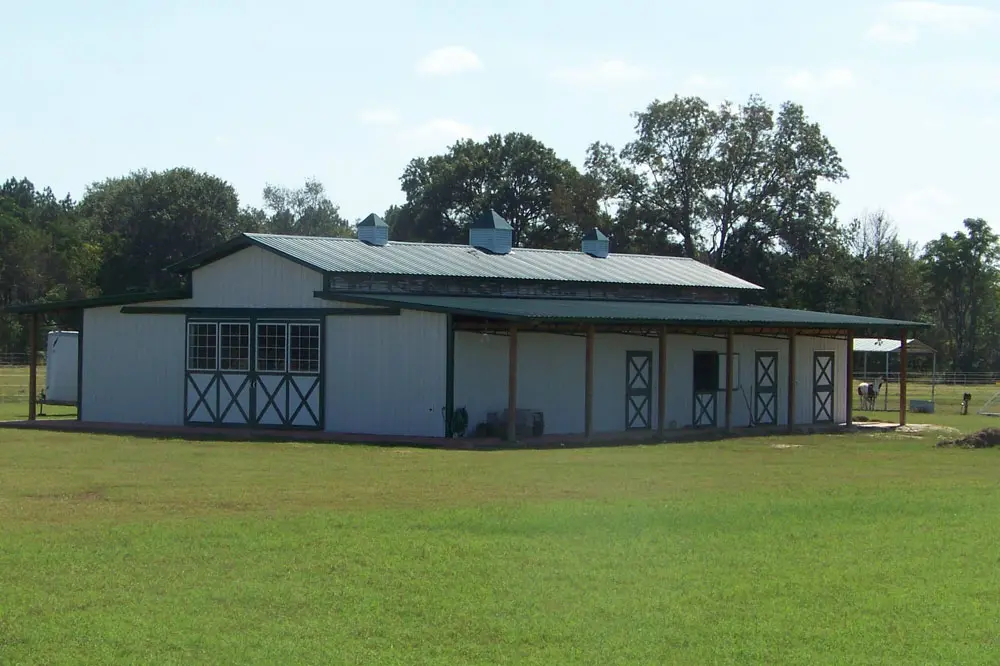 Horse stable with metal walls and roofing