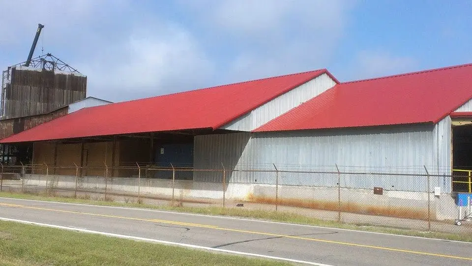 Warehouse with a red metal roofing